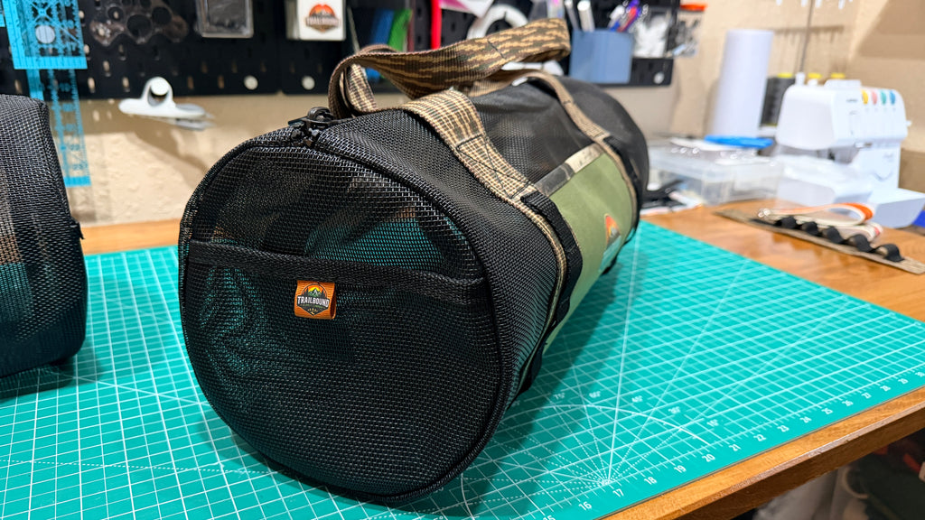TrailBound Heavy Duty Mesh Utility Duffel | Black & Camo Edition