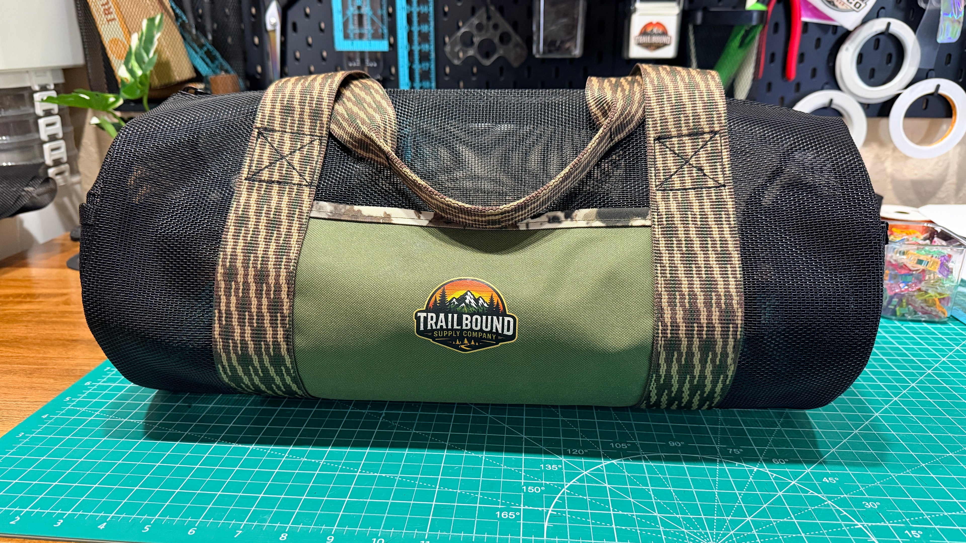 TrailBound Heavy Duty Mesh Utility Duffel | Black & Camo Edition